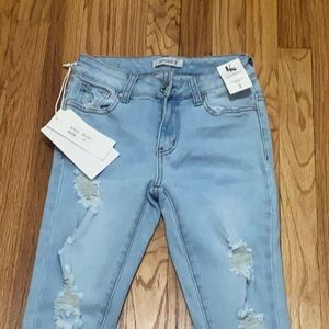 Light blue ripped skinny jeans